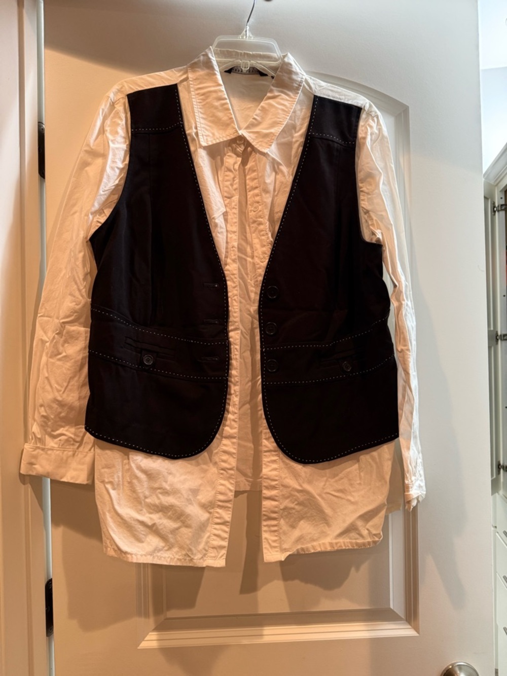 Vintage White Button-Up Shirt with Black Vest Overlay